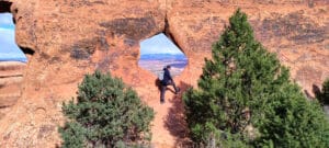 A guest enjoying the views on Best of Moab Mountain Bike tour with Escape Adventures